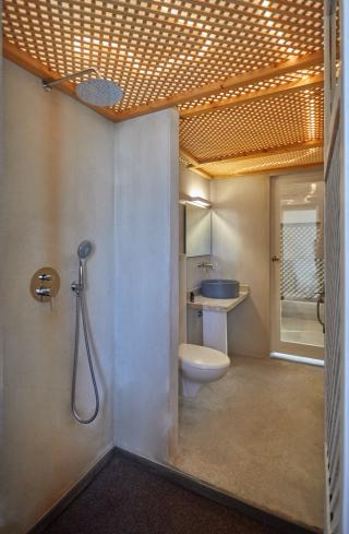 A clean bathroom featuring a shower toilet and sink designed for functionality and comfort hu6673811174819527650.jpg