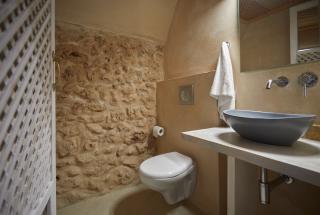 Oia santorini cellar bathroom stone wall sink hot tub hu16373067464858081978.jpg